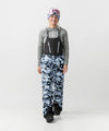 studio on-model image of strafe outerwear 2023 strafe x shredly scarlett bib in tie dye splatter color