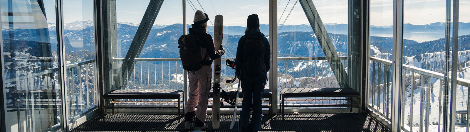 skiers in tram dock