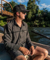 zach fishing in savage perforated shirt
